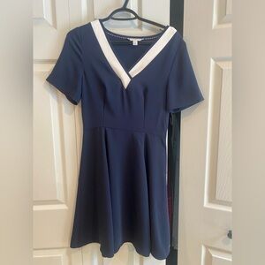 Elegant Navy Blue Dress with White Accents